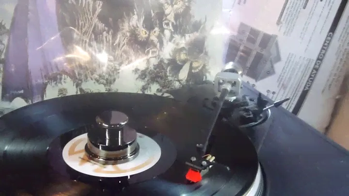 Playing a  (1975)  Nazareth  (Hair of the dog)  Vinyl Record.